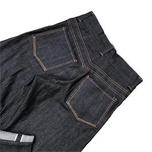 กางเกงยีนส์เดนิมญี่ปุ่นคุณภาพสูงแบบ OEM/ODM ทรงบั๊กกี้ สีอินดิโก้ ติดกระดุม ทรงหลวมตรง โอเวอร์ไซส์ สำหรับผู้ชาย - Product Image 4