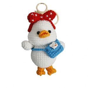 Llavero de patos con lazos de ganchillo, muñeco de punto hecho a mano, llavero de animal suave, colgante de moda para bolsos de mujer, decoración de joyería - Product Image 6