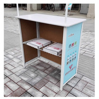 Table pliante de promotion pour salon professionnel, cadre en métal de petite taille, écologique et moderne, assemblage facile, vente en gros d'usine