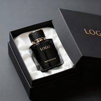 Boîte cadeau personnalisée noire avec couvercle et base magnétiques, marquage en feuille d'or et doublure en satin pour la vente au détail de cosmétiques et de parfums