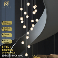Lustre suspendu en cristal LED de luxe sur mesure pour la décoration intérieure de villas, hôtels, halls d'entrée, chambres et escaliers