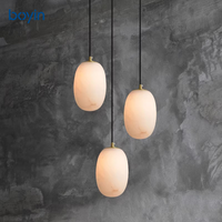 Lustre ovale minimaliste postmoderne en albâtre, lampe suspendue artistique sphérique multi-lumières pour escalier, villa, salon