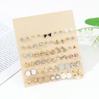 Ensemble de boucles d'oreilles tendance, design fleur, étoile de mer, papillon, en alliage, clous et pendantes, pour femmes, bijoux de luxe léger, vente en gros