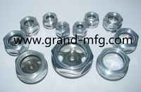 Filetage NPT 1 1/2 pouces en laiton observant le niveau d'huile