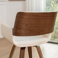 Fauteuil de salle à manger pivotant Brayven moderne en similicuir fait main avec pieds en bois, structure en bois massif écologique et structure en tube métallique