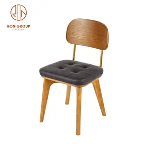 Atacado High End Moderno Agradável Boa Qualidade Sólida Cinza Madeira Capa Macia Fio De Aço Inoxidável Titanium Gold Cafe Restaurant Chair