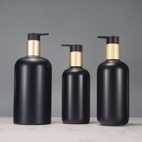 Botellas de PET Boston Redondas, Esmeriladas, Negras Mate, de Lujo, de 250ml, 300ml y 500ml, con Bomba Dosificadora Dorada para Champú y Gel de Baño