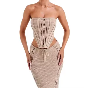 महिलाओं के लिए वसंत और गर्मियों में सबसे ज्यादा बिकने वाला नया सेक्सी ट्रेंडी बैकलेस ट्यूब टॉप, हिप-कवरिंग लंबी स्कर्ट बुना हुआ सूट के साथ