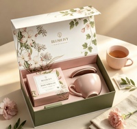 Boîte en carton magnétique de luxe en forme de livre, personnalisée avec impression, avec insert en EVA pour l'emballage cadeau de sachets de thé et d'ensembles de tasses à thé