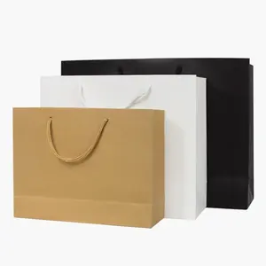 थोक सस्ते कस्टम लोगो निजी लेबल के साथ क्राफ्ट पेपर उपहार पैकेजिंग खरीदारी पेपर बैग लोगो