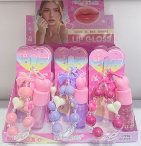 Brillo Labial con Efecto Espejo y Doble Hidratación, con Diseño de Pulsera y Colgante Adorable, para un Acabado Luminoso y Realce del Tono de Piel - Product Image 5