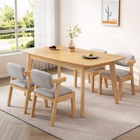 Ensemble table et chaises de salle à manger en bois massif moderne et durable pour 6 personnes, idéal pour les petits appartements et les salons.
