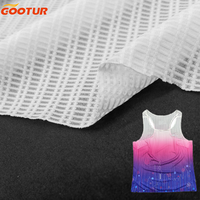 Tissu tricoté en maille respirante avec conception à grille 93% Polyester 7% Spandex Textile pour la fabrication de gilets de course et de vêtements de sport