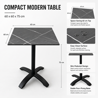 Table de bistrot moderne de 60 cm carrés, aspect marbre, avec base en piédestal noir pour café, restaurant, hôtel, salle à manger