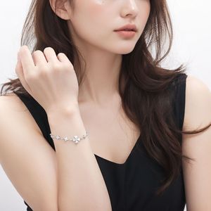 สร้อยข้อมือโคลเวอร์สี่แฉกโลหะผสมสังกะสีโซ่ปรับได้ดีไซน์ดอกไม้ของขวัญเครื่องประดับสตรี - Product Image 2