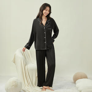 Vêtements de nuit pour femmes en soie glacée ensemble de vêtements confortables et minimalistes pyjamas classiques de couleur unie pour vêtements de maison pour femmes vente en gros - Product Image 1