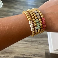 Bracelets extensibles personnalisés avec perles initiales, perles dorées, breloques œil porte-bonheur et pendentif cœur émaillé – Cadeaux d'anniversaire pour elle