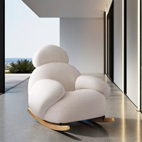 Fauteuil inclinable moderne avec fonction de balancement et accoudoirs, idéal pour salon, chambre ou hôtel