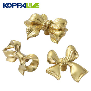 Koppalive tembaga kreatif busur simpul pegangan kenop emas laci lemari pintu kabinet busur pegangan kuningan padat - Product Image 1