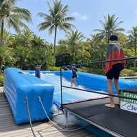 Simulateur de surf gonflable commercial portable bleu clair en PVC et acier inoxydable 304, 2 personnes, 100 kg, prix bas
