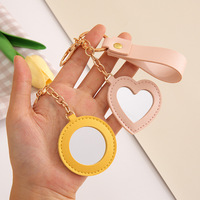 Porte-clés en cuir PU en forme de fleur et de cœur mignon Mini miroir de luxe cadeau pendentif sac étiquette porte-clés