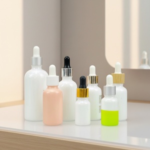 Cosmetic Essential Oil Glass <b>Bottle</b> 10ml 15ml 20ml 30ml 50ml Silk Screen White Opal Serum <b>Bottle</b> With Bamboo Cap - Product Image 1