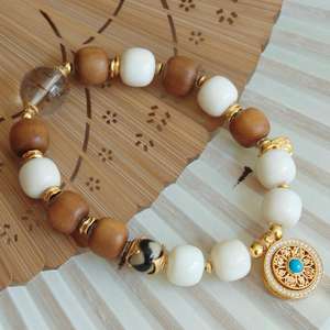 Bracelet ethnique Maya en pierre perlée, style palais, avec pendentif rotatif en forme de boussole à huit trésors, unisexe, forme de boule - Product Image 1