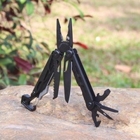 Outil multifonctionnel de camping en plein air noir, prise en charge OEM personnalisée, défense personnelle, survie, utilisation domestique, pince combinée