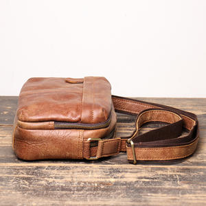 Sac bandoulière unisexe en cuir véritable avec fermeture éclair, grande capacité, imperméable, design tendance - Product Image 1