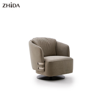 Fauteuil moderne gris à accents, canapé individuel confortable avec base métallique rotative et revêtement en coton pour salon et chambre