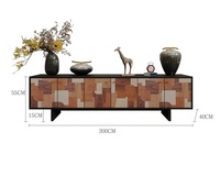 Armoire de rangement vintage de style mi-siècle pour cuisine, salon ou couloir, avec un design asymétrique et géométrique abstrait, en patchwork, et tiroirs de présentation