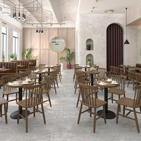 Ensemble de canapés de restaurant en cuir vert avec tables à piétement en bois et chaises à dossier en spirale pour salle à manger de restaurant moderne