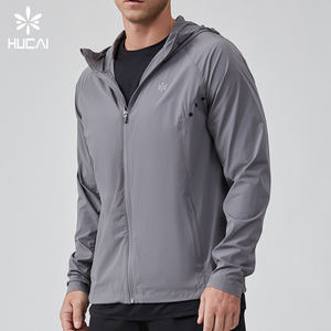 ODM HUCAI カスタムメーカー ナイロン スパンデックス 軽量 反射素材 熱転写 ワークアウト アウトドア ジム ランニングジャケット メンズ - Product Image 1