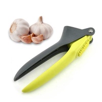 2023 Gadgets de cuisine haut de gamme, outil manuel broyeur d'ail en plastique presse à ail facile