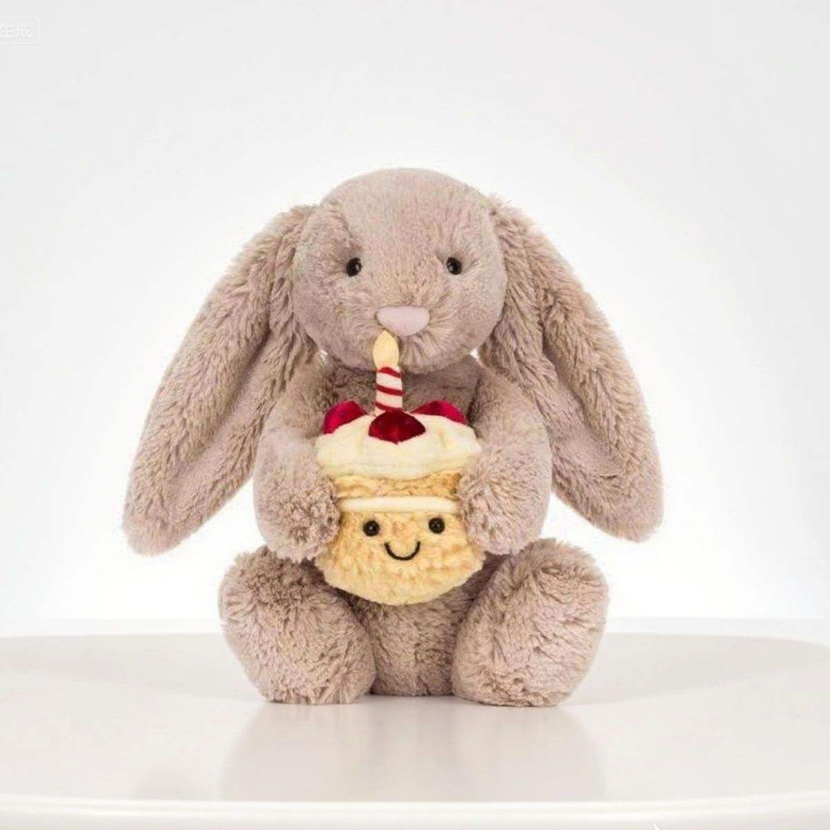 Rabbit holding birthday cake 30cm