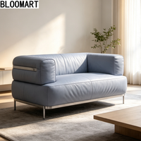 Moderner Echtleder-Einzelsessel mit Edelstahlgestell Designer-Akzentsessel für Wohnzimmer