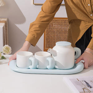 Service à thé en céramique crémeuse avec théière et deux tasses pour la maison et les cadeaux - Product Image 5