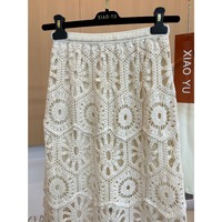 Nouvelle collection été 2026 : Jupe midi en crochet crème pour femme, taille haute, coupe trapèze, dentelle ajourée festonnée, style bohème élégant, faite main, grandes tailles, vente en gros