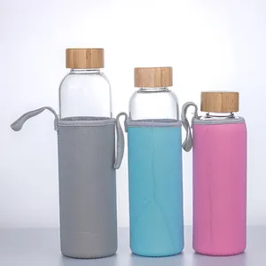 Wholesale reusable bamboo lid 550ml clear borosilicate glass water bottle with protective case