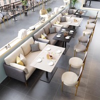 Ensemble table et chaises de restaurant/hôtel au design moderne et épuré avec plateau en ardoise, structure en fer et canapé en cuir PU pour cafés commerciaux