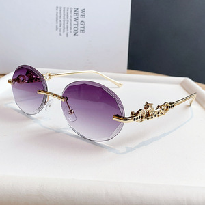 Gafas de Sol Ovaladas Sin Montura con Degradado y Decoración de Leopardo, Protección UV400, Unisex, Moda para Adultos - Product Image 1