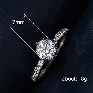Anello da donna con taglio rotondo, tono argento, con pietre scintillanti, gioiello alla moda da indossare sul dito - Product Image 3