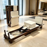 Lit de Pilates en bois de noyer chinois de haute qualité, directement de l'usine, portable et pliable pour usage au bureau, disponible en gros