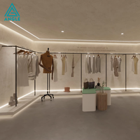 Meubles de boutique de vêtements sur mesure, présentoirs de vêtements tendance, design d'intérieur pour boutique de vêtements féminins