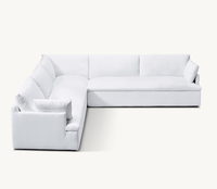 Canapé d'angle modulable en forme de L avec coussin d'assise et accoudoir gauche Cloud Track pour salon et chambre d'hôtel