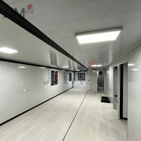 Maison conteneur extensible JJM 20 pieds, 2 chambres, modulaire préfabriquée avec système d'énergie solaire, utilisation hôtelière, design moderne, garantie 5 ans