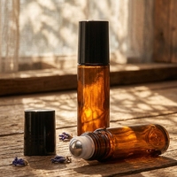 Bouteilles en verre dépoli transparent/ambre/bleu de 5 ml et 10 ml avec bouchons dorés/argentés/noirs et applicateur à bille en acier inoxydable pour huiles essentielles et parfums