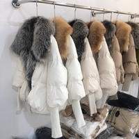 Vente en gros de manteau de luxe tricoté avec col en fourrure Veste en duvet moelleuse de haute qualité à la mode pour l'automne et l'hiver avec bordure en fourrure de renard