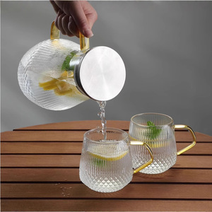 Juego de jarras de agua de vidrio con asa, resistentes al calor, de gran capacidad, para servir bebidas en el hogar. - Product Image 4
