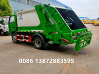 Camion compacteur de collecte de déchets diesel Dongfeng 4x2 Camion collecteur d'ordures à transmission manuelle Camion de transport Noyau Moteur Boîte de vitesses